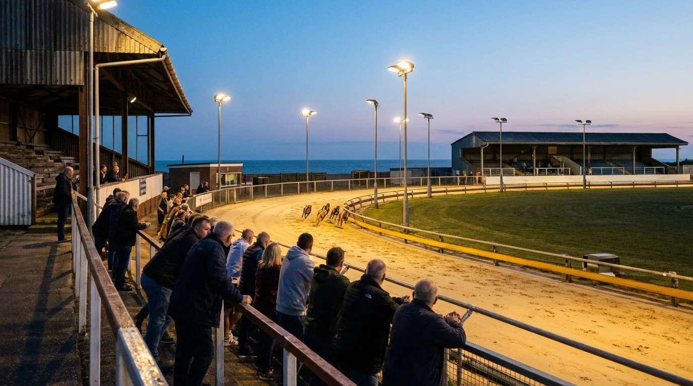 Hove greyhound stadium on the south coast of England during an evening race meeting